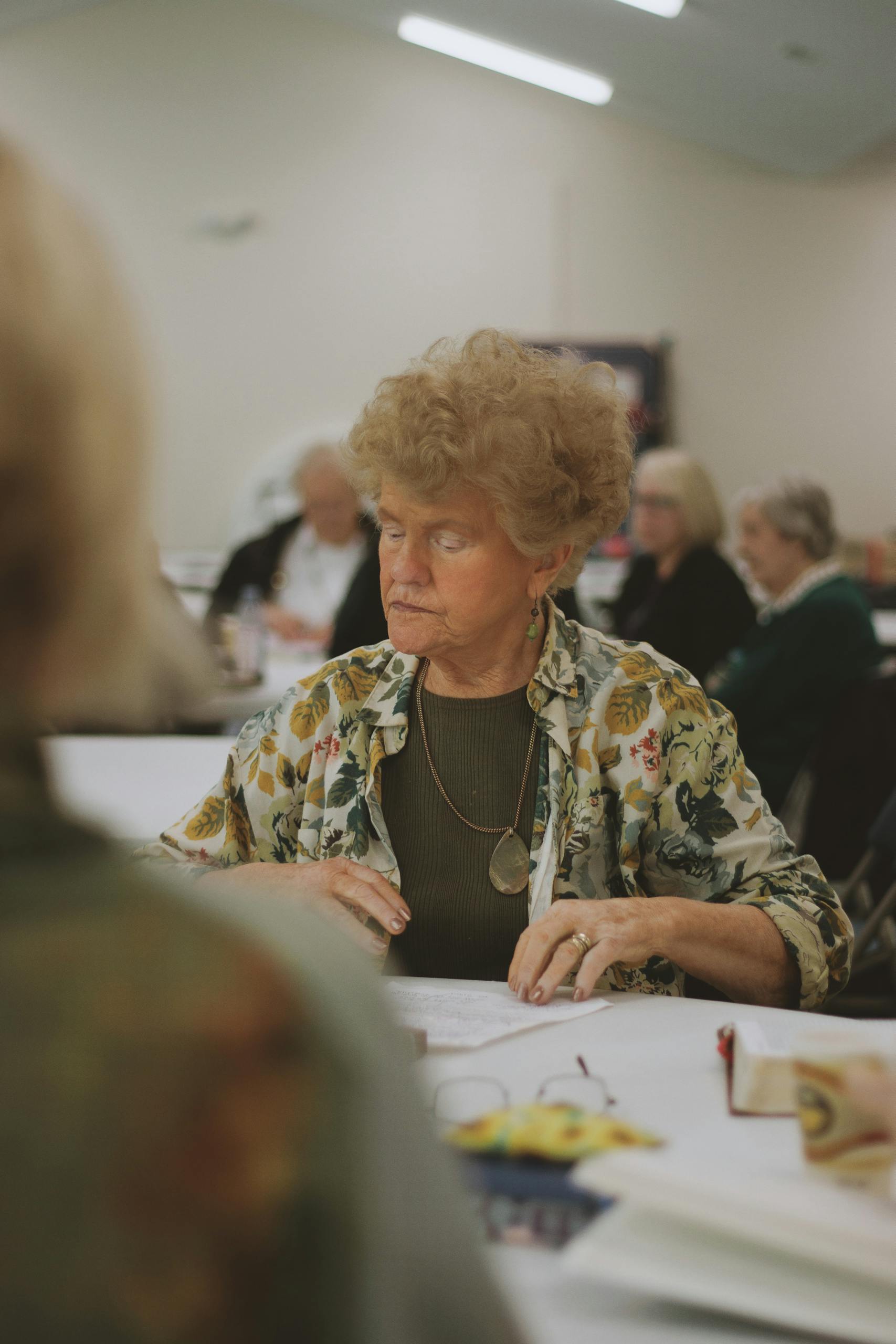 Candid capture of community members engaging in a Bible study in Brevard, NC.